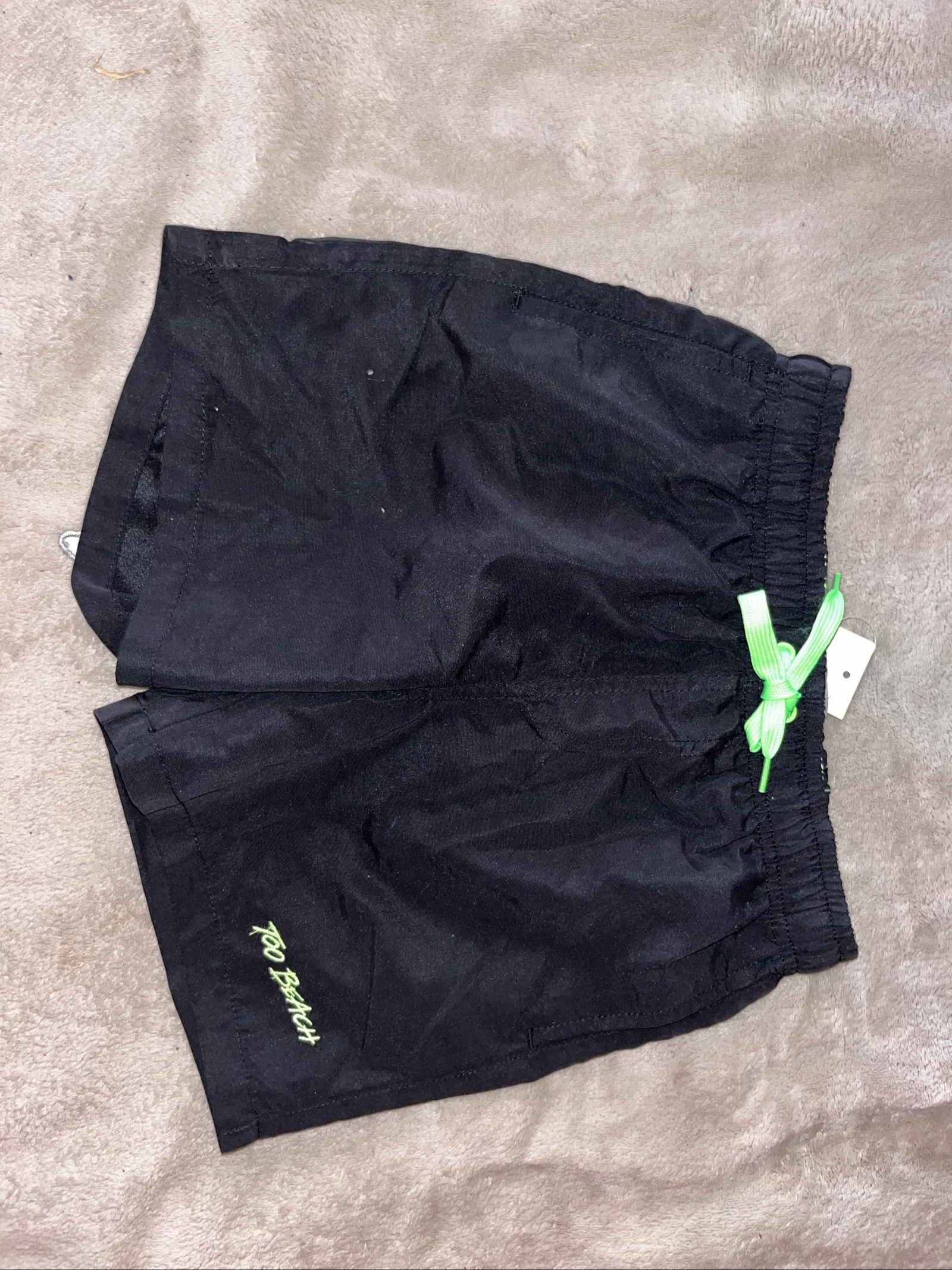 Maillot de bain garçon 8 ans noir et vert neuf